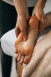 massaging foot